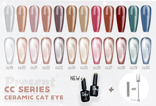 A collection of nail polish colors labeled as 'Present Ceramic Cateye' with a glossy finish. The colors range from light to dark and are displayed in a fan-like arrangement with the brand name and shade numbers visible.