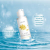 A bottle of JOVISA Lash Primer floating in splashing water against a light blue background, with two circular callout bubbles describing its benefits.